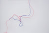 By a Thread