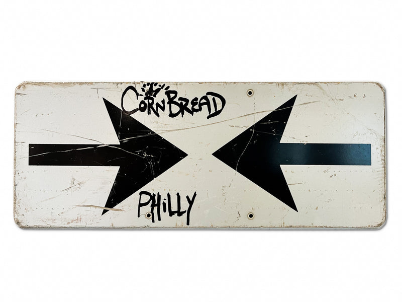 Cornbread Philly Sign (black arrows)