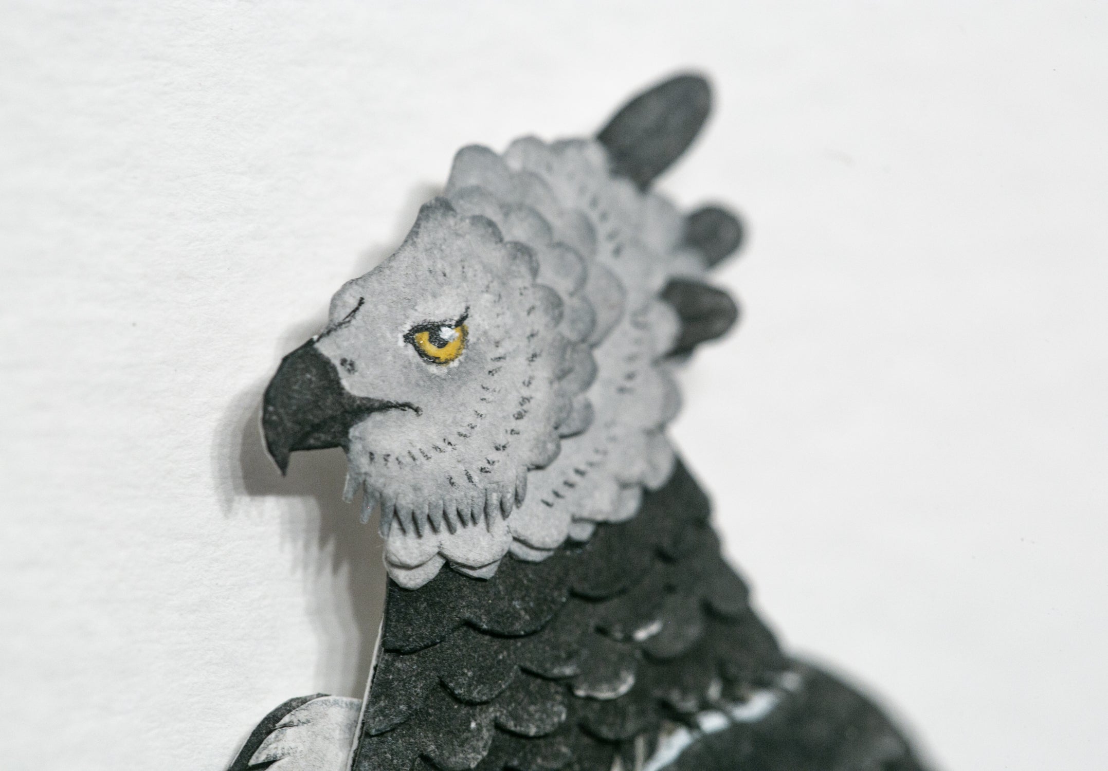 a stunning harpy eagle. The art nouveau-inspired piece emanates