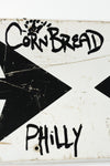 Cornbread Philly Sign (black arrows)
