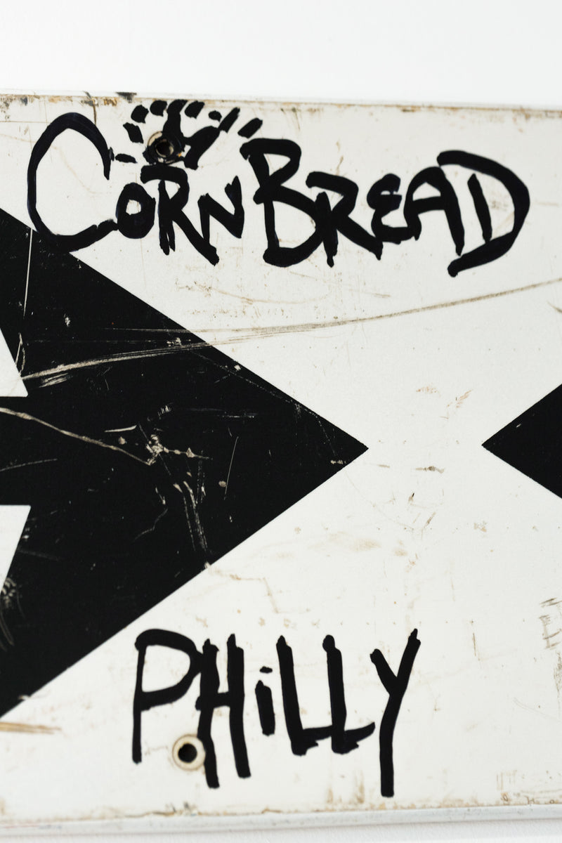 Cornbread Philly Sign (black arrows)